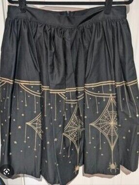 Pinup Couture Laura Byrnes Black Skirt with Gold Spiderweb Print